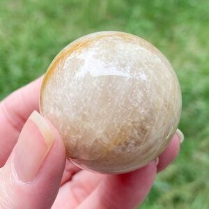 Peach Moonstone Crystal Sphere with Blue Flash.